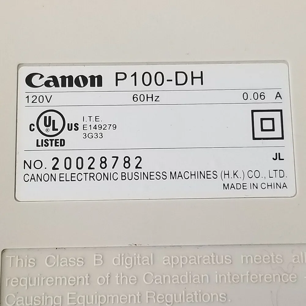 Canon p100-dh 12 characters printing Calculator works